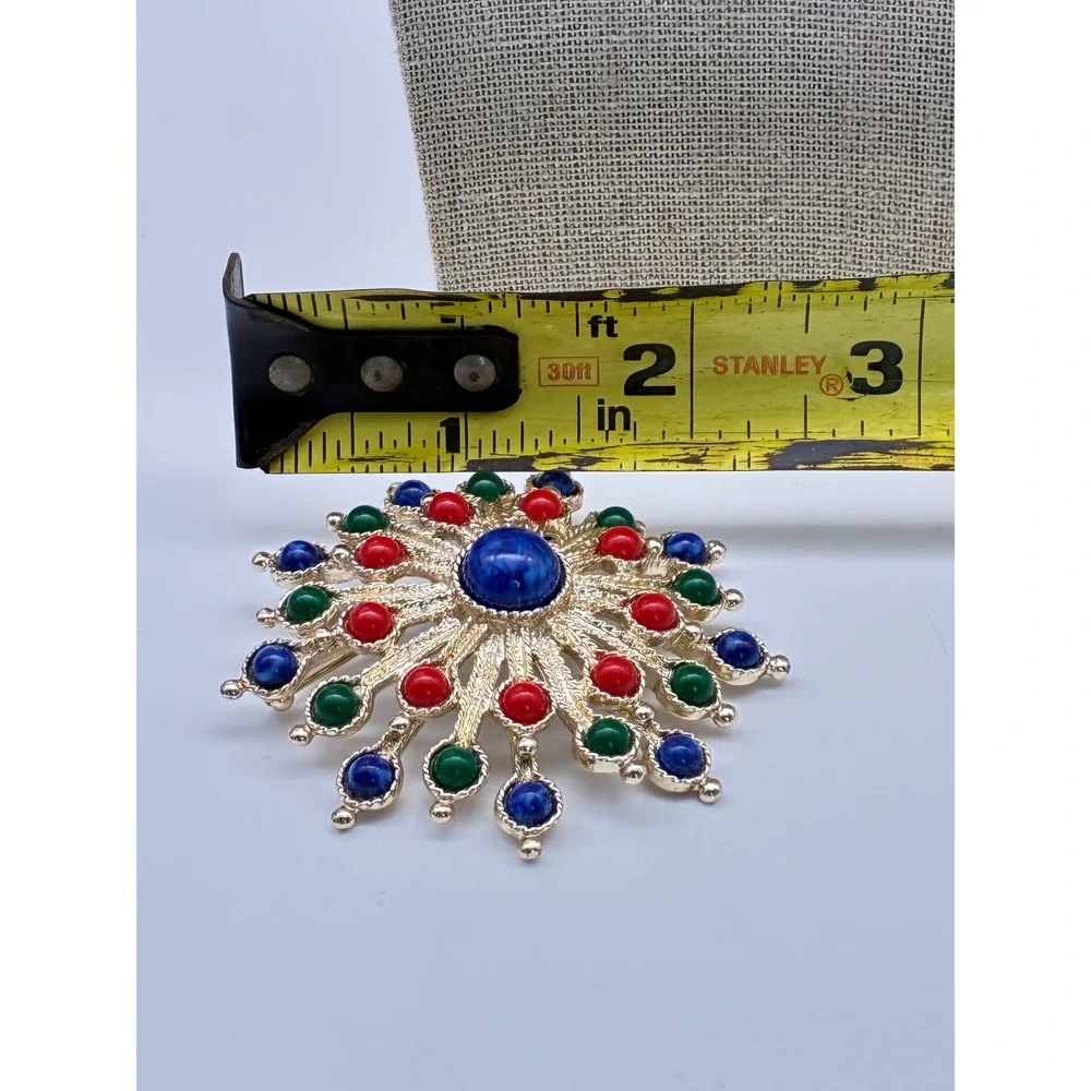 Vintage Sarah Coventry Gold Tone Multi Color Cabochon Sunburst Brooch Pin